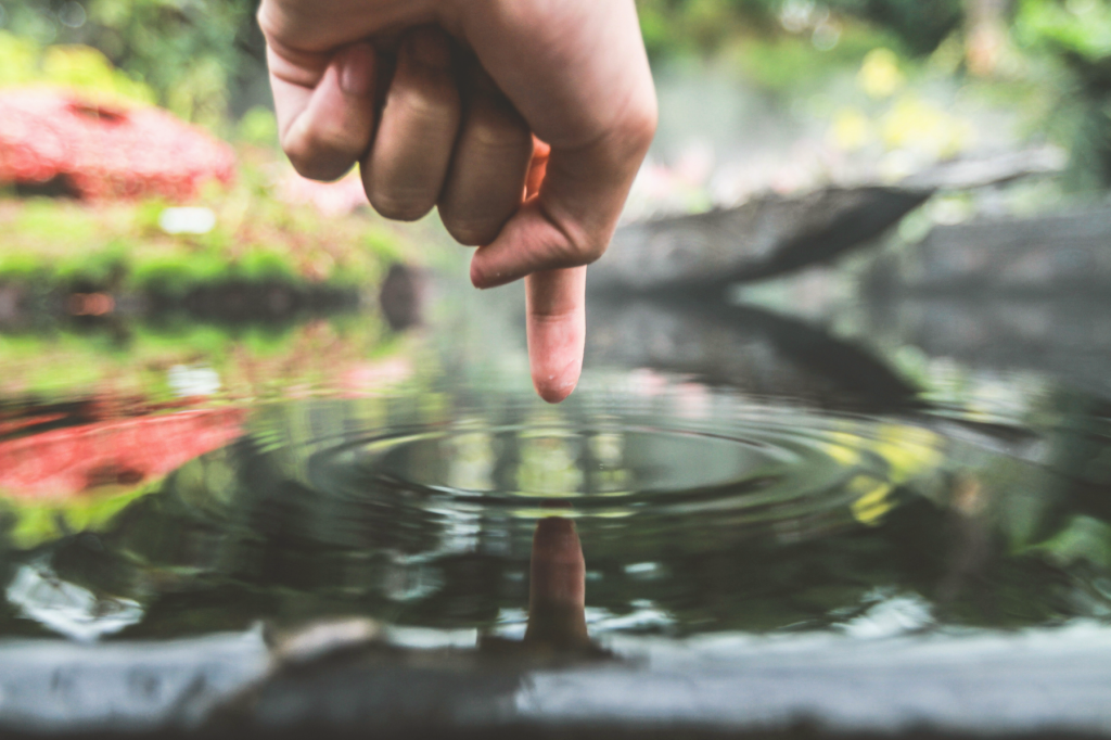 Gentle ripple in water representing calm, healing, and integration of mind and body.
